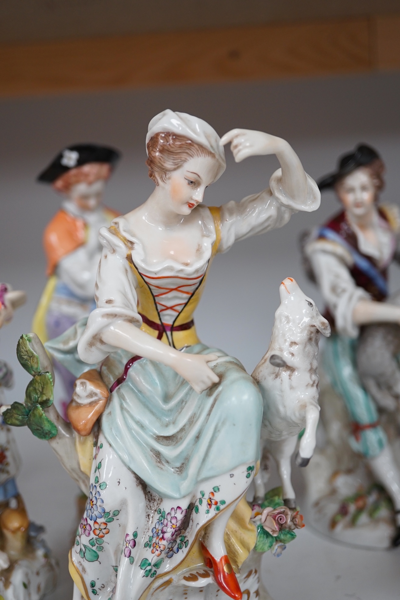 Six German porcelain figures by Sitzendorf, Dresden, etc. tallest 21.5 cm. Condition - good.